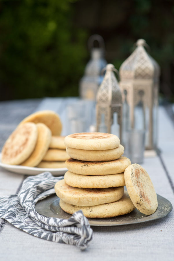 Moroccan bread, Botbout, on table with lanterns