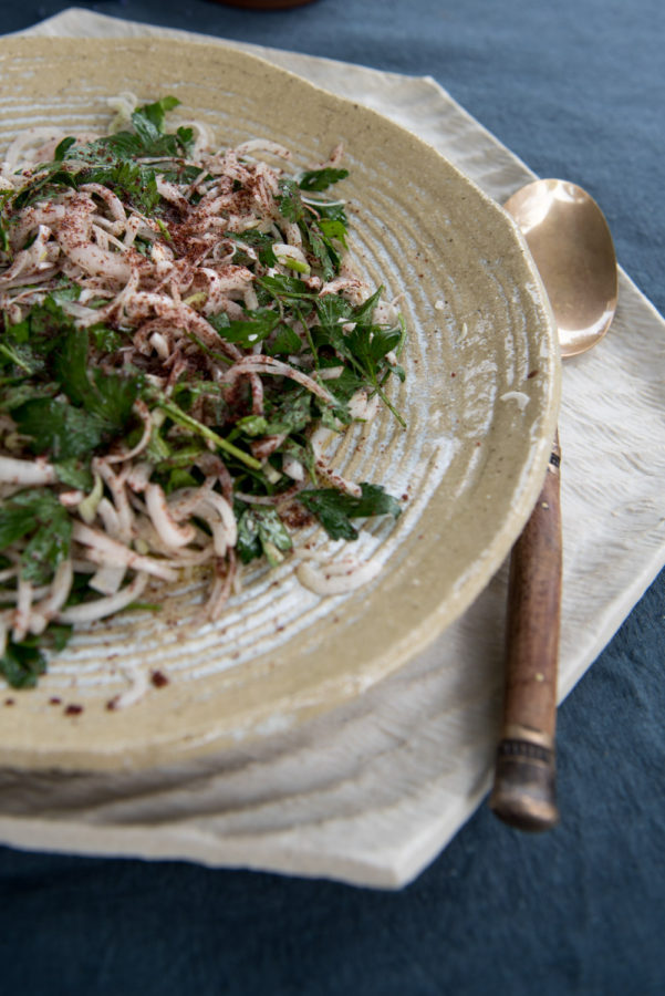 onion and clantro salad on white plate